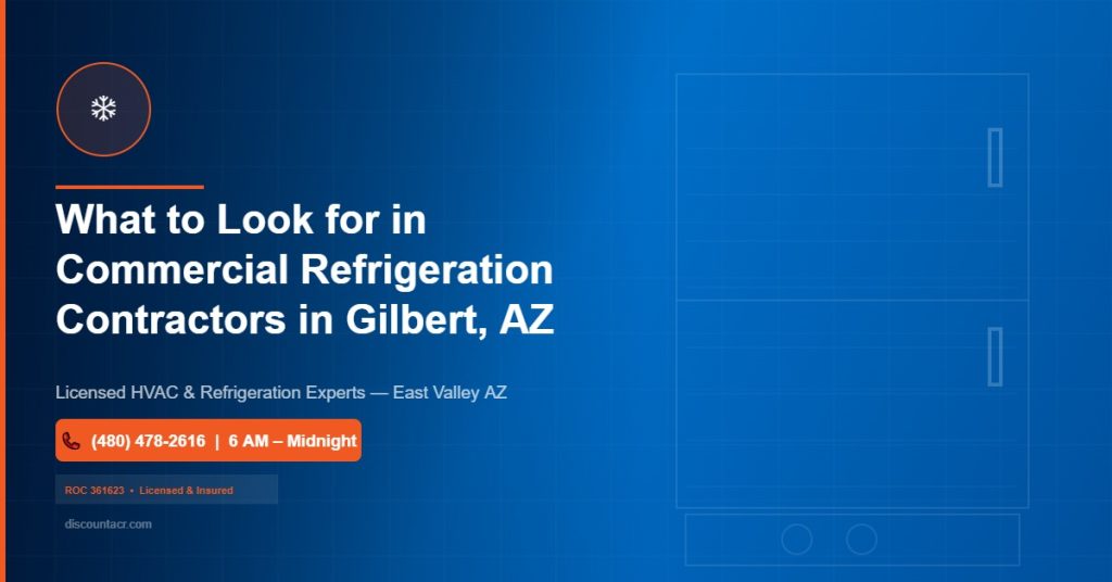 Licensed commercial refrigeration technician inspecting walk-in cooler condenser coils inside a Gilbert Arizona restaurant kitchen