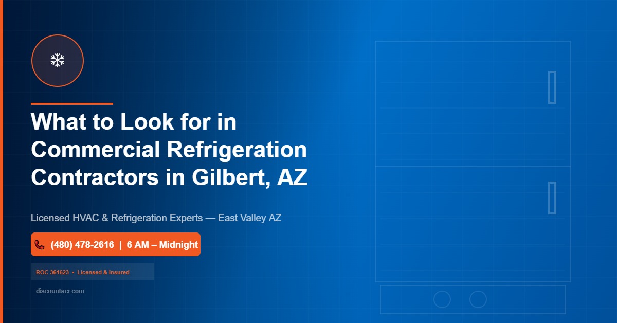 Licensed commercial refrigeration technician inspecting walk-in cooler condenser coils inside a Gilbert Arizona restaurant kitchen