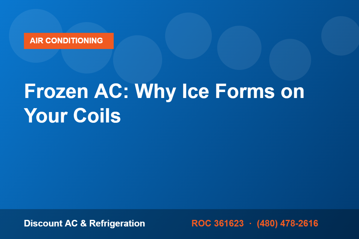 Frozen evaporator coil covered in ice inside a residential air conditioner in Gilbert, Arizona